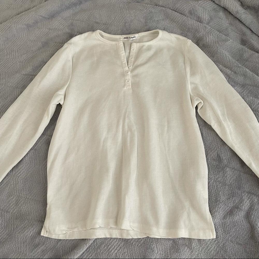 White top with buttons